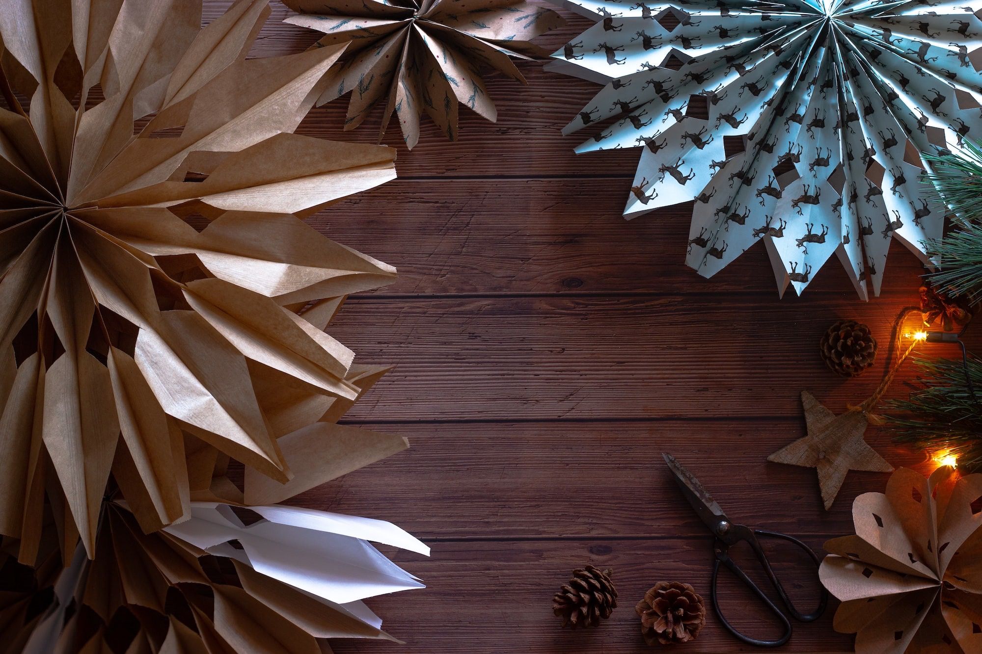 white paper boats on brown wooden floor